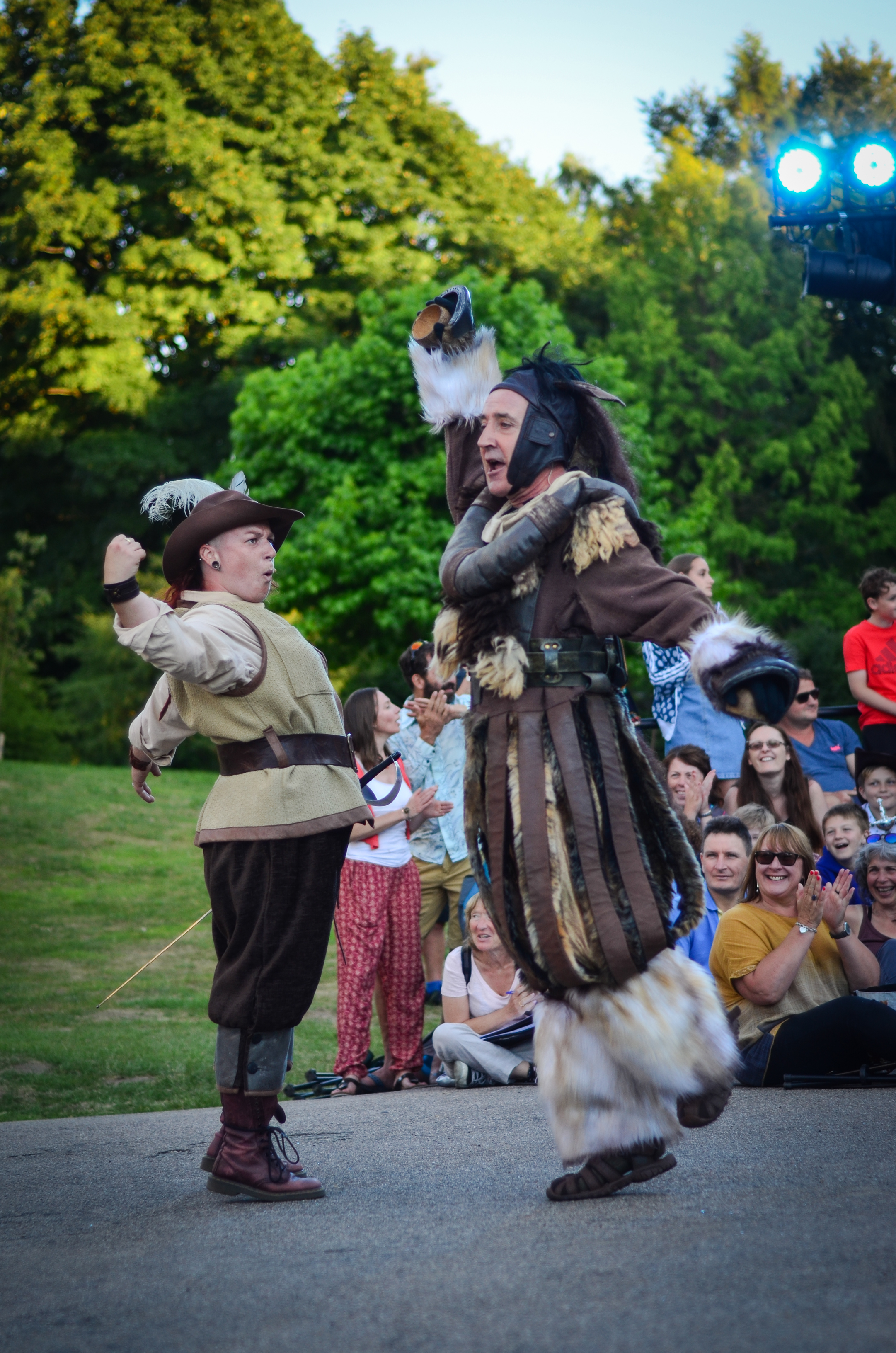 Lucy Jane Parkinson (D'Artagnan) and Christopher Bianchi(Planchet) horsing around in a scene from The Three Musketeers