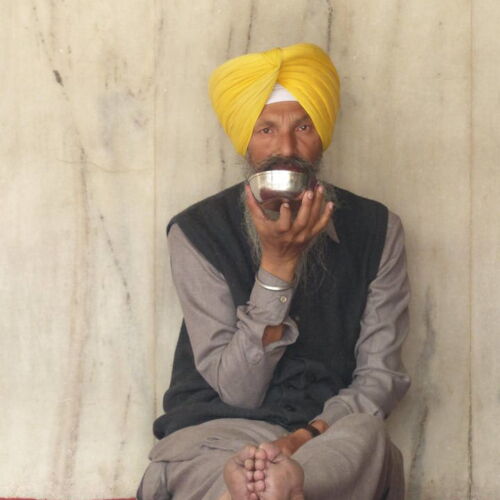 Chai Break India Photos of India, man sat drinking Chai