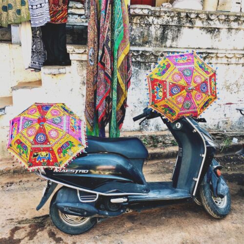 In case of rain! Photos of India, colourful umbrellas on a scooter in an Indian market