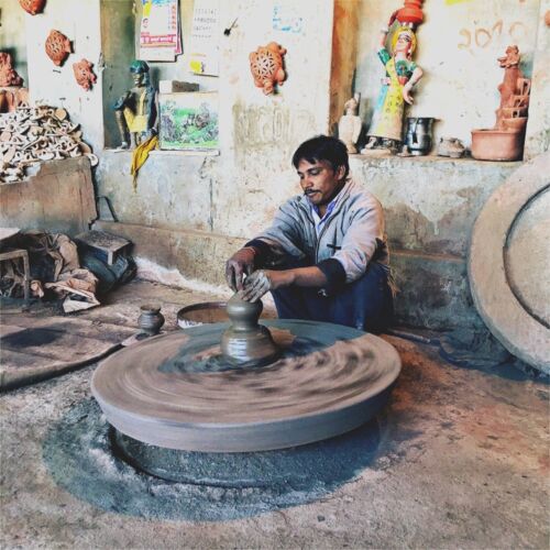 Potters wheel Photos of India, A man making a pot on a potters wheel