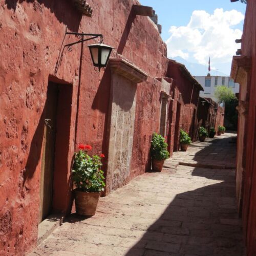 Photos of Peru, Deep orange buildings in narrow lanes within the Sanat Catalina Monastery
