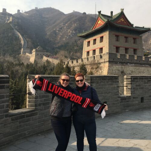 Great Wall of China Claire and Kerry holding a Liverpool scarf at the Great Wall of China