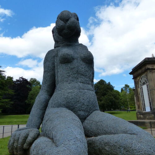 Sitting by Sophie Ryder A giant rabbit/human sculpture