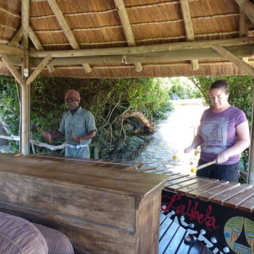 Music at Lalibela Claire playing a xylophone
