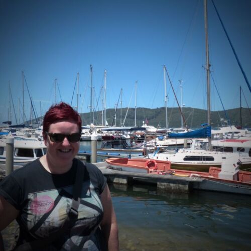 The harbour at Knysna Kerry at a harbour with boats in the background